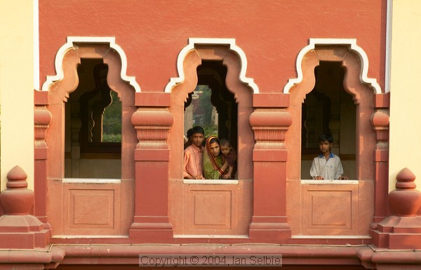 Visitors looking out of the temple, Delhi
