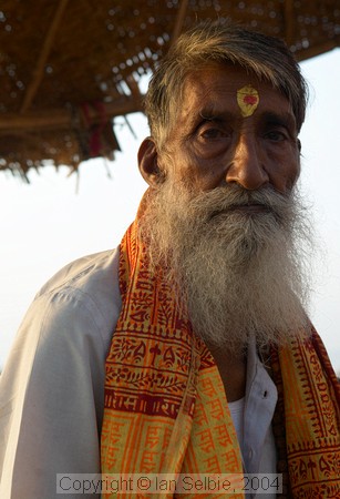 Sadhu on the Ghat by the Ganges at Varanasi, will bestow a blessing for 50 rupees