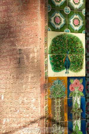 In the crowded lanes of old Varanasi are some amazing sights including these beautiful tiles and sanskrit inscriptions