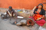 Roadside blacksmith and his wife, old city, Jaipur