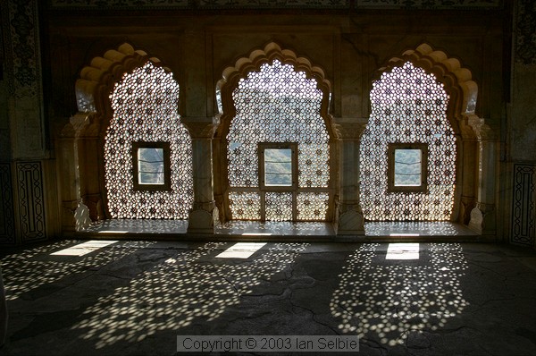 Light pours through the lattice windows, arches, Amber Palace, Jaipur
