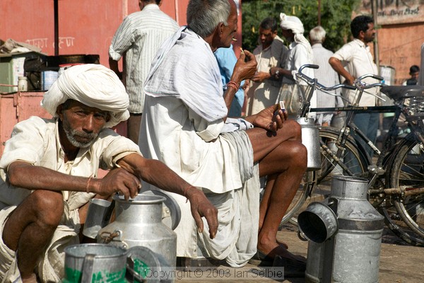 Men from the villages come to sell their milk in Jaipur