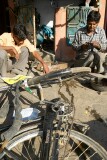 Road side bicycle repair man and his latest job, Jaipur