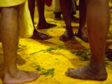 Yellow Tumeric powder everywhere on the floor at the Thimithi (fire walking) ceremony, Singapore 2003