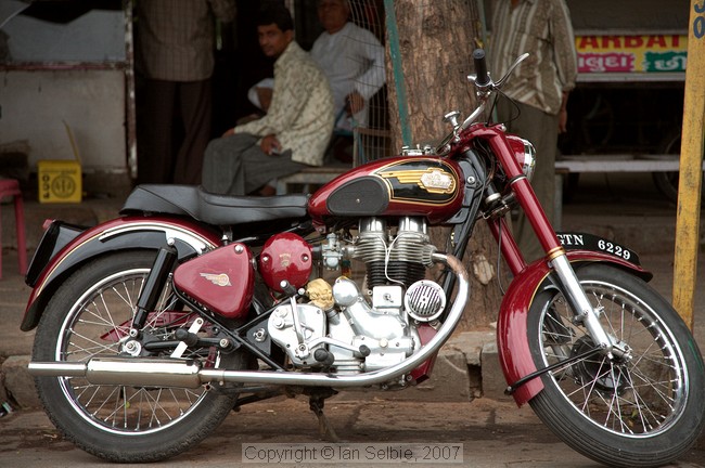 The owner told me this was an original 1960's Royal Enfield Bullet, but I have my doubts because the speedometer is in Kilometres