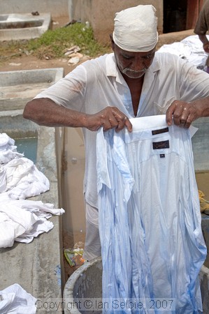 Dipping shirts in Blue to get them white