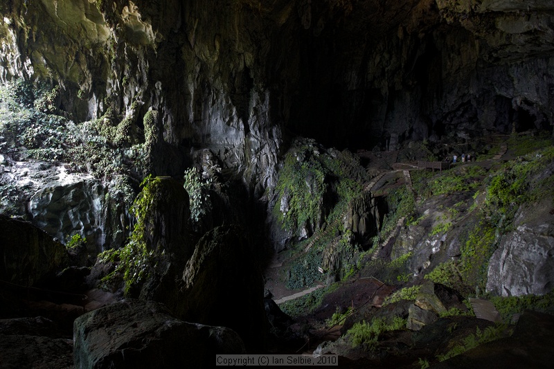 "Fairy" and "Wind" Caves, Bau, Sarawak, East Malaysia (Borneo) (Look for the humans in the picture to appreciate the scale of the cave)