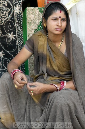 Women selling colourful textiles near the Tibetan Market, Delhi