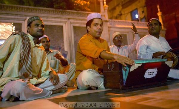 Musicians playing after evening prayers  at the Tomb of Nizammudin, Delhi