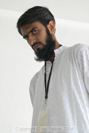 At the Delhi arts and crafts exhibition, a delegate from Madhya Pradesh watches over the photographer with suspicion