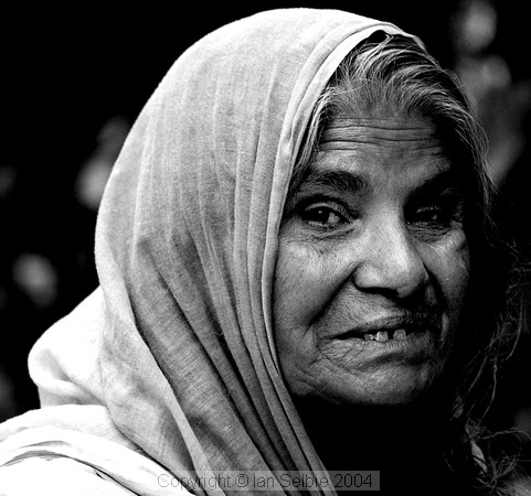 Beggar at the Janpath Lane textiles market
