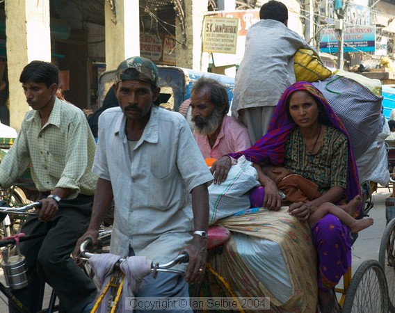 Trishaws ("Indian Helicopters") make up much of the traffic in Chandni Chowk, Old Delhi
