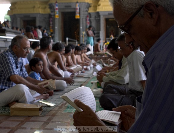 Studing texts at celebration of the Full Moon at Sri Senpaga Vinayagar Temple, Ceylon Road, Singapore