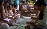 Studying texts at celebration of the Full Moon at Sri Senpaga Vinayagar Temple, Ceylon Road, Singapore