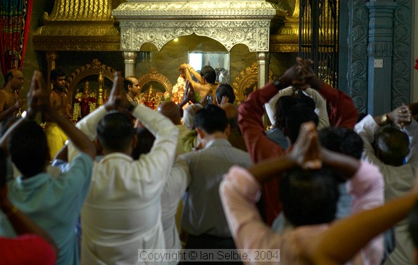 Pouring milk over the statue of Lord Ganesha on his birthday at Sri Senpaga Vinayagar Temple, Ceylon Road, Singapore