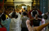 Pouring milk over the statue of Lord Ganesha on his birthday at Sri Senpaga Vinayagar Temple, Ceylon Road, Singapore
