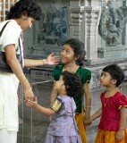 Little girls and their mother at celebration of the Depavali Festival at Sri Senpaga Vinayagar Temple, Ceylon Road, Singapore