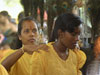 Thaipusam - Massage after long trek bearing milk bowl