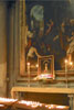 Candles and painting  in  Basilica Santa Croce