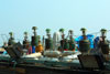 Lamps strung along the roof of the trawler for night use