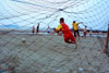 Football, Malaysian style, on the beach