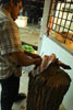 The butcher of Mersing skinning the head of a cow