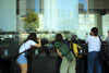 Photographers looking for reflections near Singapore river