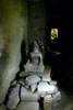 Statue in Passage way in  Ta Prohm