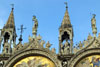 Statues on the upper lunettes of the Doge's Palace