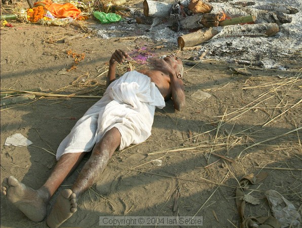 The old ascetic has moved closer to the ashes of the funeral fire
