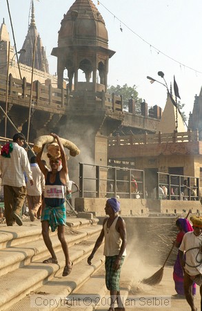 Carrying the wood up from the boats