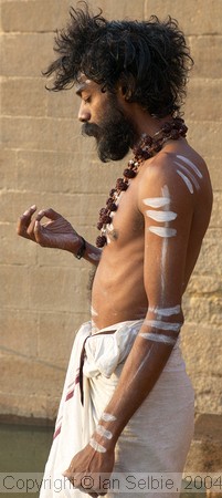 Meditating prior to bathing in the Ganges