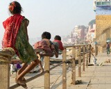 Children playing on the fence, Mir Ghat, Varanasi