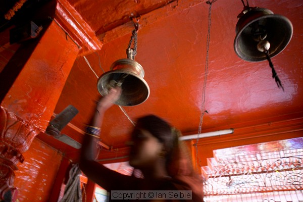 Ringing the bells upon entry to the Temple,  Varanasi