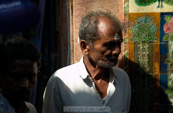 In the crowded lanes of old Varanasi are some amazing sights including these beautiful tiles and sanskrit inscriptions