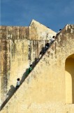 People climbing steps on the Samrat Yantra (the largest Sundial in the world) at the Jantar Mantar (Observatory) of Sawai Jai Singh, Jaipur