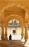 Woman sitting in the inner meeting place, Amber Palace, Jaipur