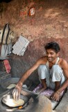 Man making chapati by the roadside, Jaipur