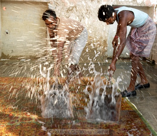 Men washing a new carpet, Jaipur