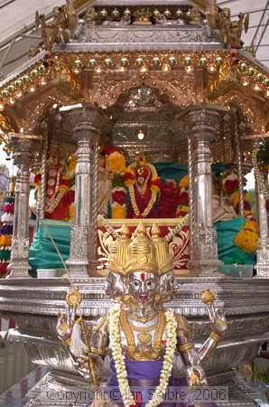 Moving the deities from the previous location in the golden and silver chariots