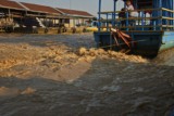 Fishing community in Chong Khneas on the Siem Reap river and floating on the Tonle Sap lake in Cambodia