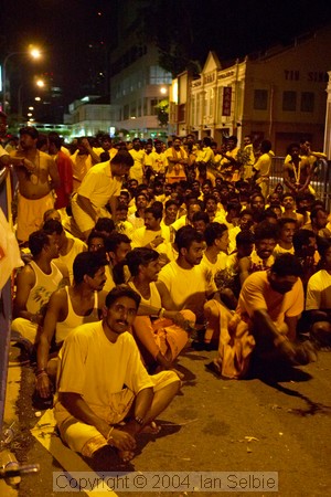 Crowds waiting outside the temple to perform the Thimithi (fire walking) ceremony, Singapore 2003