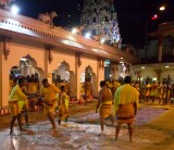 Walking the coals before dawn at the Thimithi (fire walking) ceremony, Singapore 2003