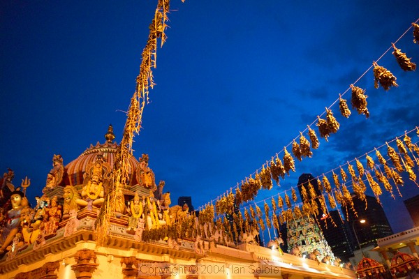 Skyline  before dawn at the Thimithi (fire walking) ceremony, Singapore 2003